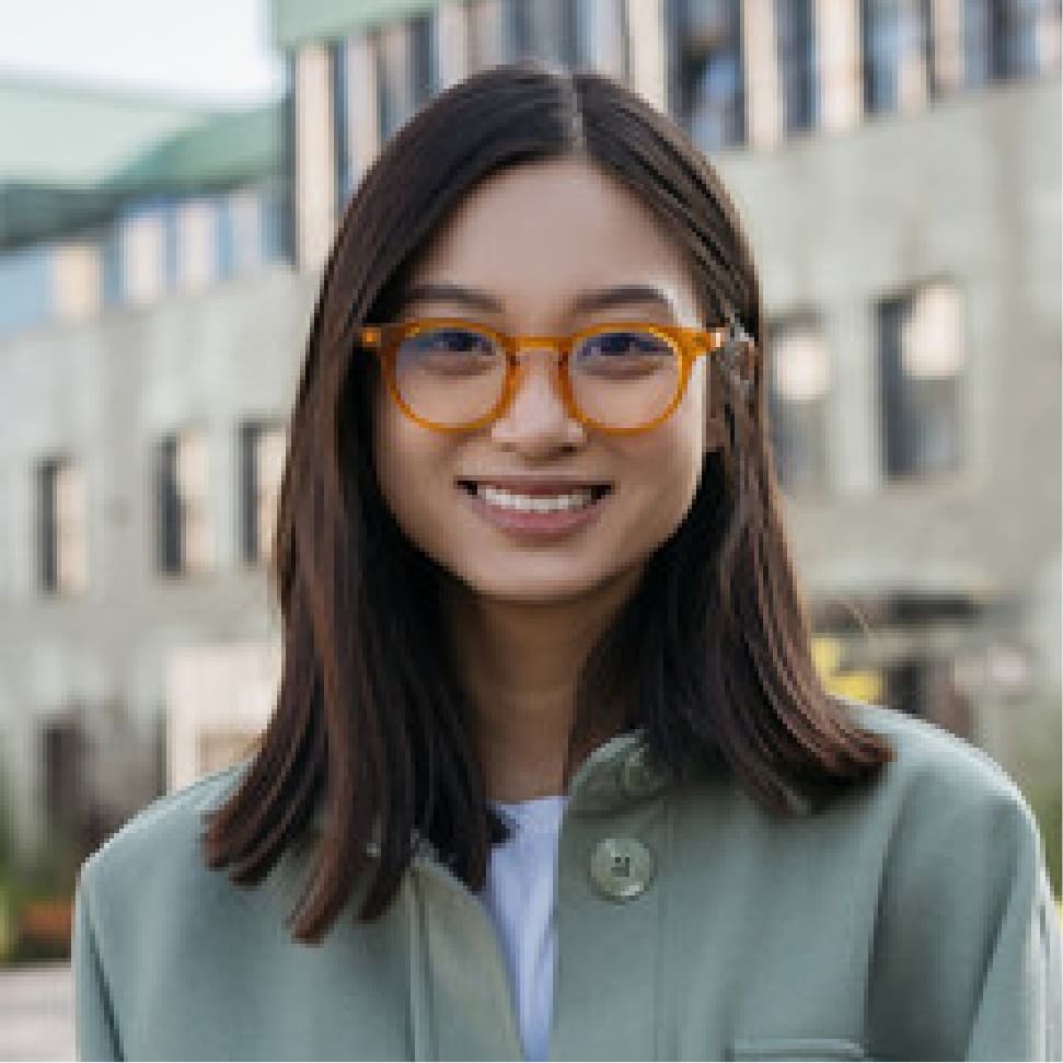girl wearing orange glossy glasses